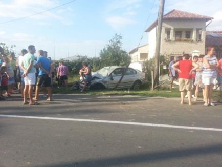 Beată turtă, o şoferiţă de BMW a pierdut controlul maşinii în curbă şi a intrat într-o conductă de gaze, la Sântandrei